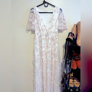 Gorgeous Baltic Born dress with floral lace. New without tags! Size large.